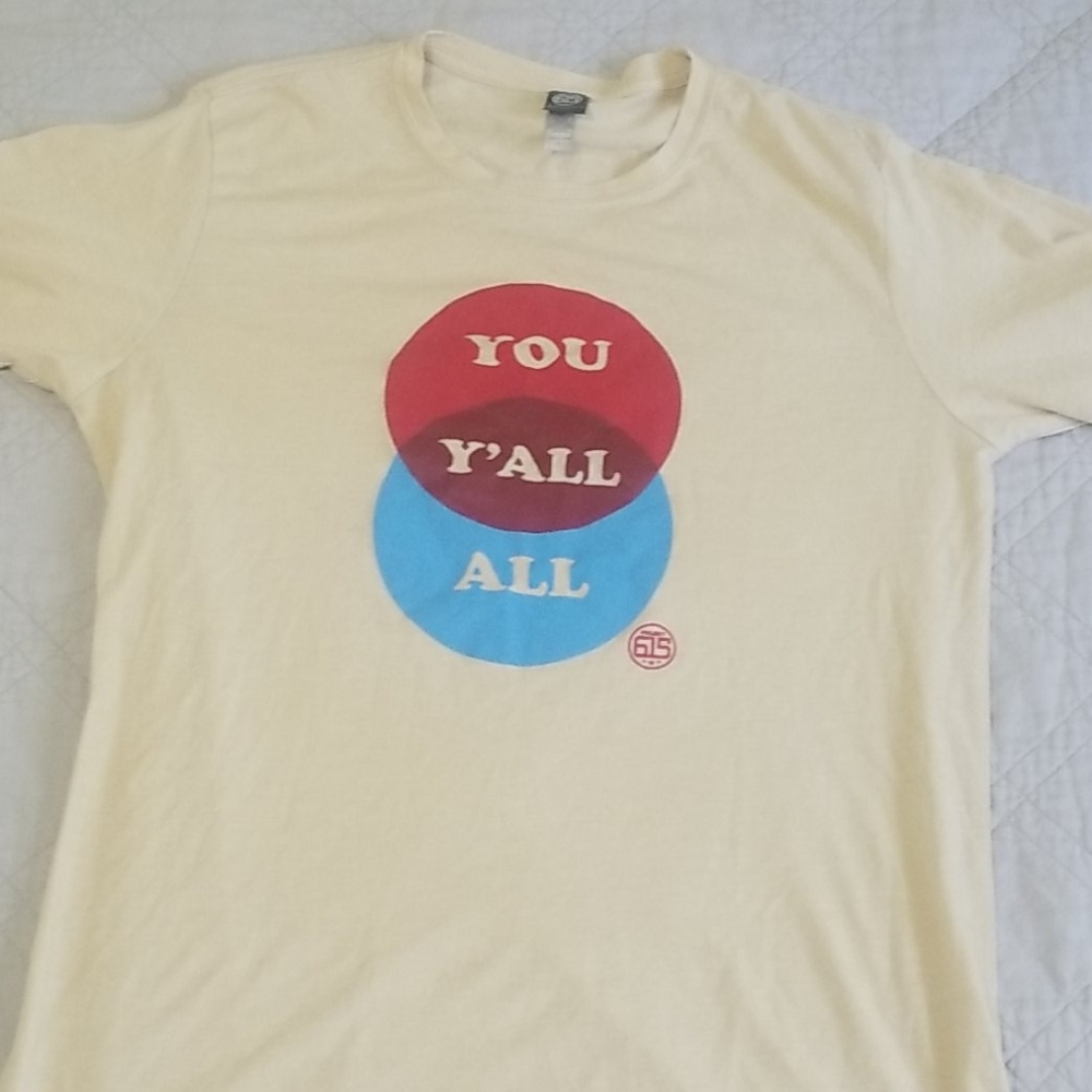 Tan/cream mens large tshirt explaining "y'all"